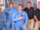 Astronauts Bob Behnken, KE5GGX, (second from right) and Doug Hurley (right) have joined the ISS crew headed by Chris Cassidy), KF5KDR (center). [NASA photo]